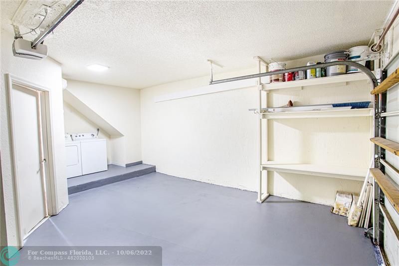 Winston Park Coconut Creek, FL 33073 - Photo 14 of 35 a view of storage and utility room with washer and dryer