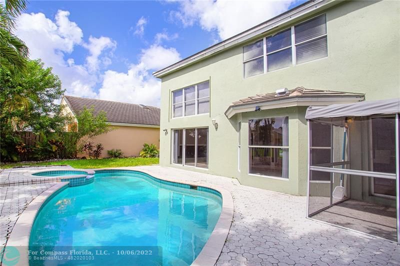 Winston Park Coconut Creek, FL 33073 - Photo 31 of 35 a view of a house with a yard