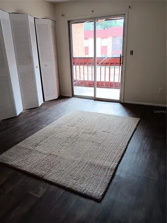 a balcony view with a wooden floor