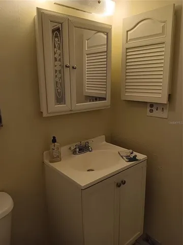 a view of a chairs and table in the patio