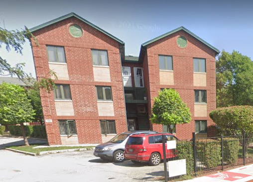 1928 South Wells Street, Unit 1 Chicago, IL 60616 - Photo 2 of 9 a front view of a house with a yard