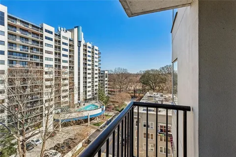 a view of balcony with furniture