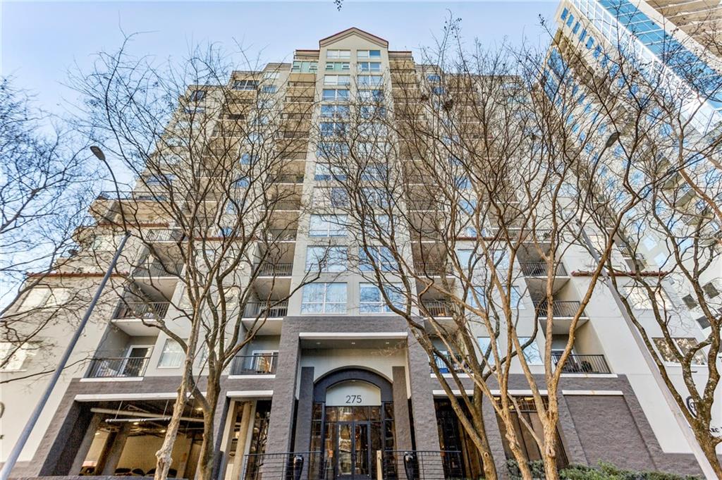 275 13th Street Northeast, Unit 707 Atlanta, GA 30309 - Photo 17 of 17 a view of multiple houses with a yard