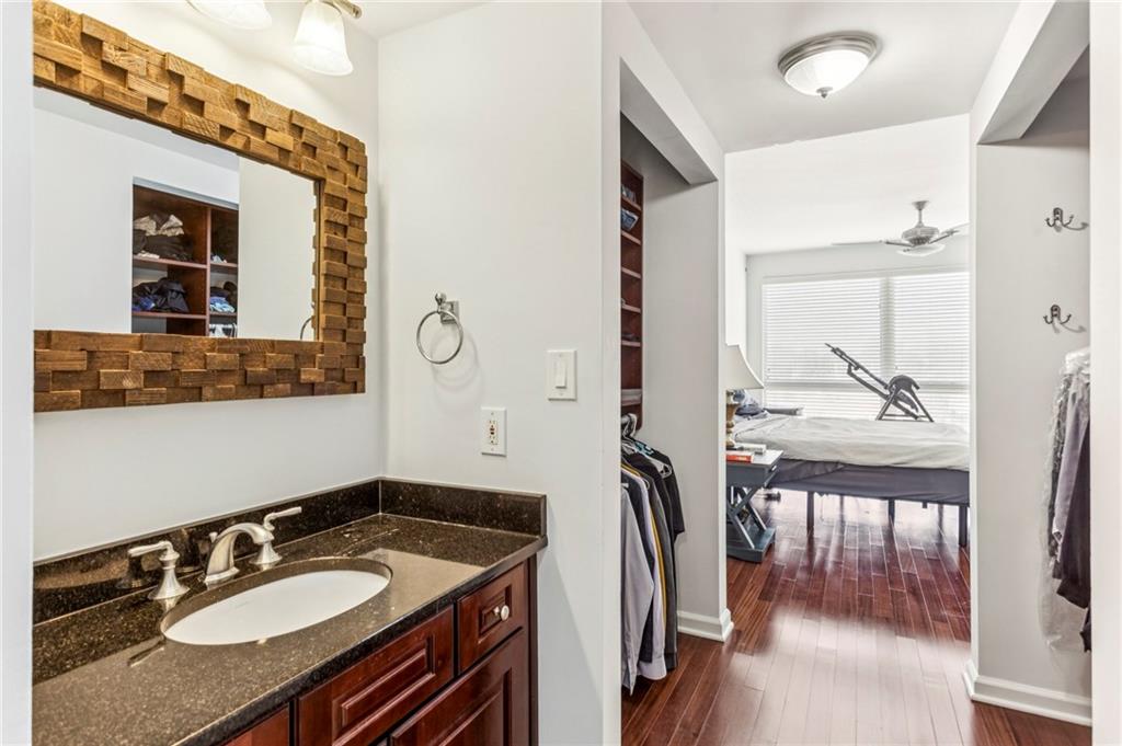 275 13th Street Northeast, Unit 707 Atlanta, GA 30309 - Photo 8 of 17 a bathroom with a sink and a mirror