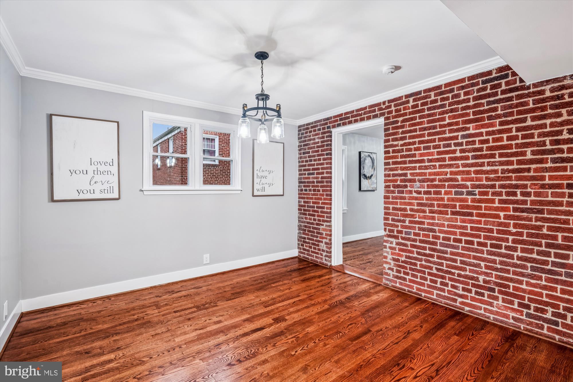 5408 14th Place Hyattsville, MD 20782 - Photo 17 of 49 a view of a livingroom with wooden floor and window