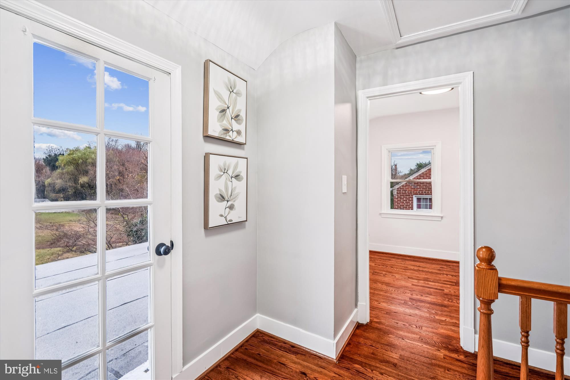 5408 14th Place Hyattsville, MD 20782 - Photo 20 of 49 a view of a hallway with wooden floor and entryway