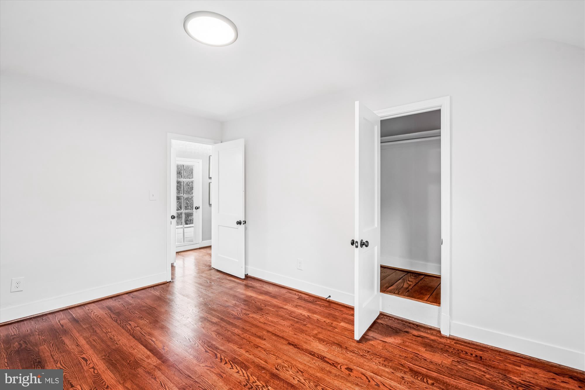 5408 14th Place Hyattsville, MD 20782 - Photo 26 of 49 an empty room with wooden floor and entryway