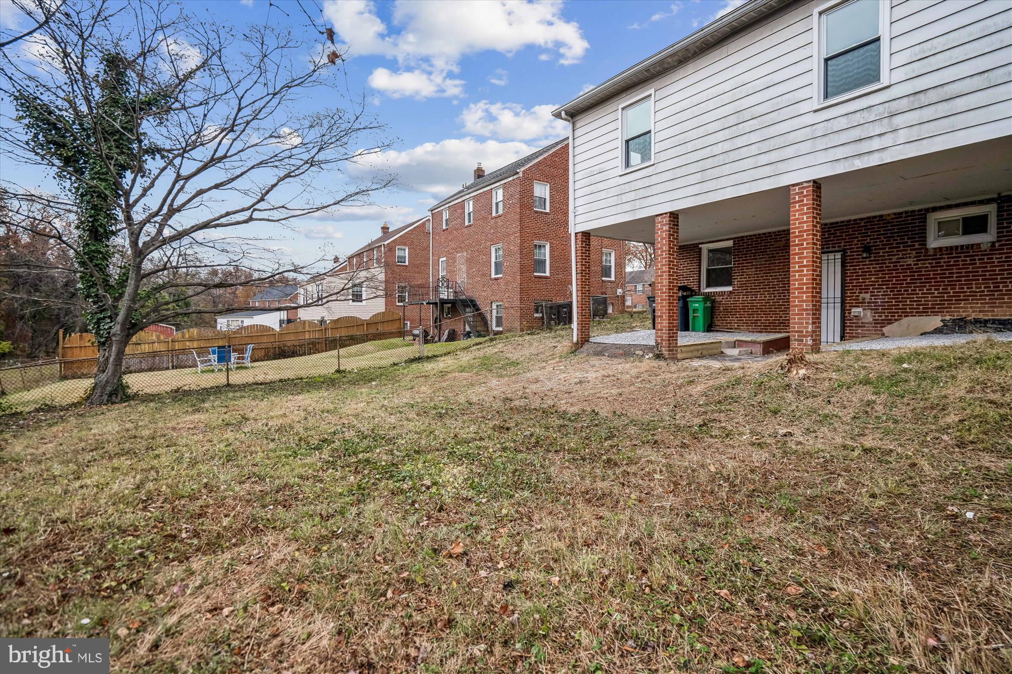 5408 14th Place Hyattsville, MD 20782 - Photo 30 of 49 a view of a house with a yard and sitting area