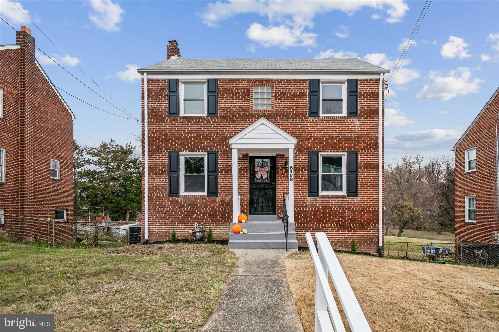5408 14th Place Hyattsville, MD 20782 - Photo 3 of 49 a front view of a house with a yard