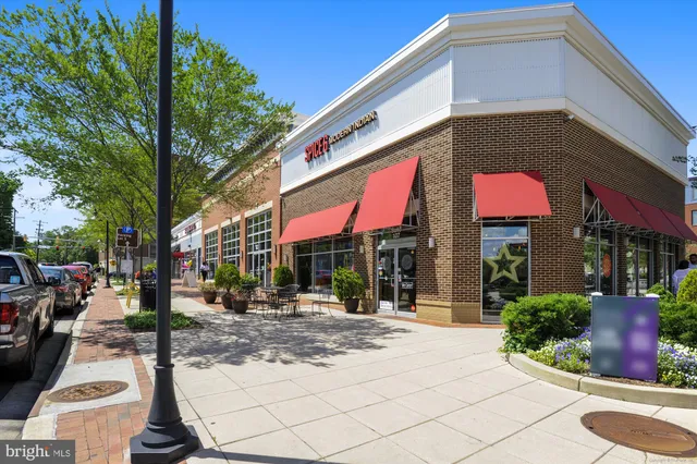 a view of a building with traffic signal
