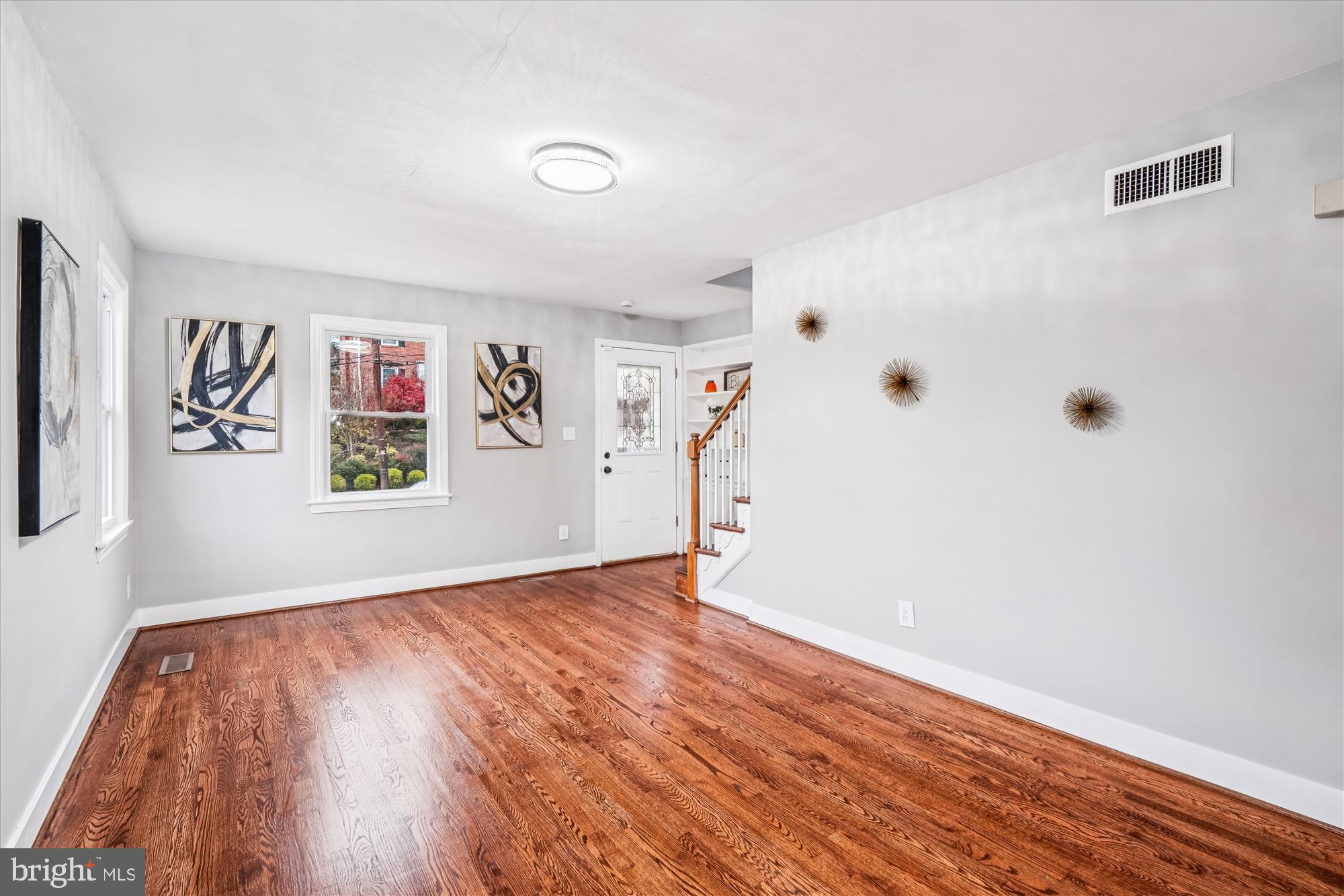 5408 14th Place Hyattsville, MD 20782 - Photo 4 of 49 a view of a room with wooden floor