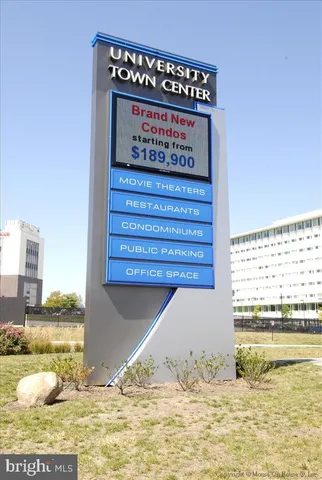 a view of a car park in front of a building