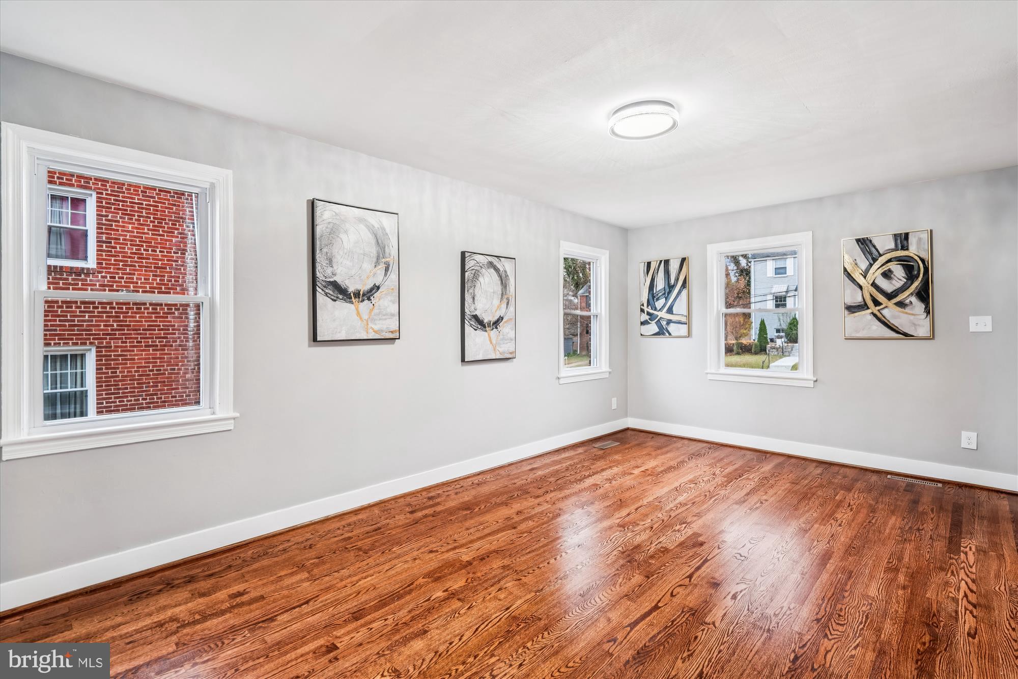 5408 14th Place Hyattsville, MD 20782 - Photo 5 of 49 a view of empty room with wooden floor and window