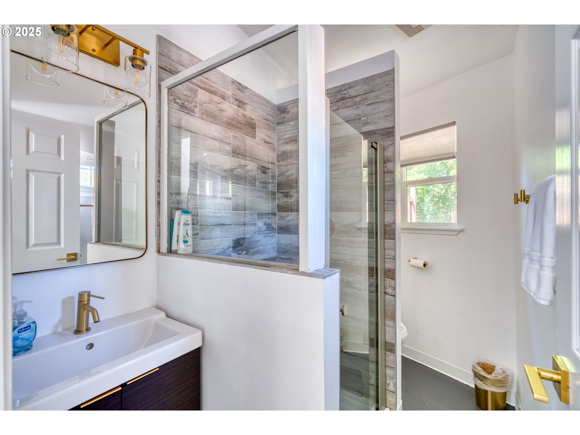 9647 Southwest Capitol Highway Portland, OR 97219 - Photo 13 of 33 a bathroom with a sink and a mirror