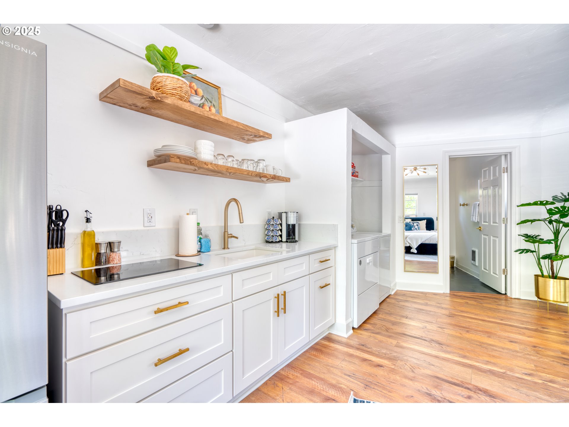 9647 Southwest Capitol Highway Portland, OR 97219 - Photo 19 of 33 a spacious bathroom with stainless steel appliances a sink and a window