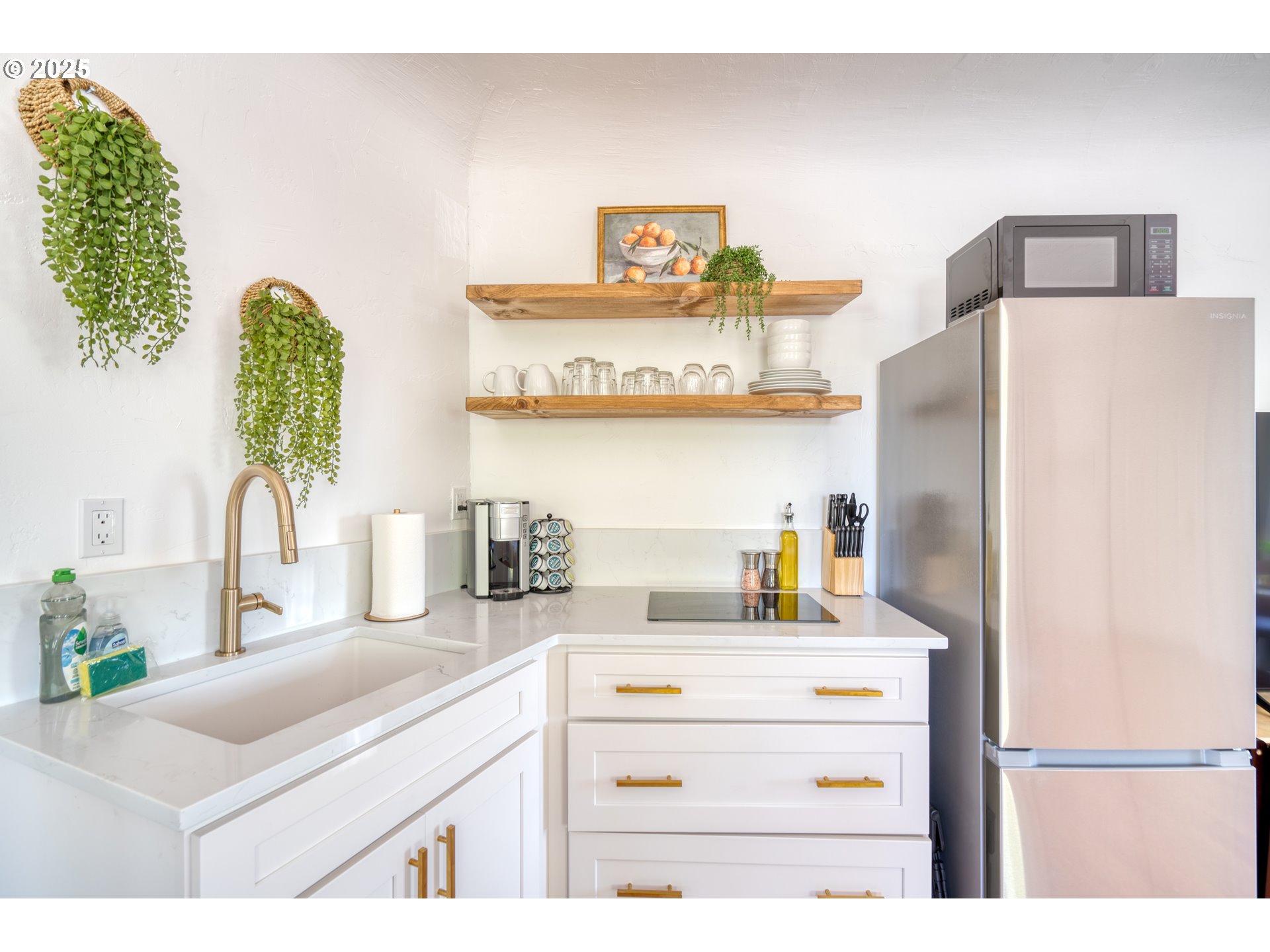 9647 Southwest Capitol Highway Portland, OR 97219 - Photo 22 of 33 a kitchen with a refrigerator and a sink