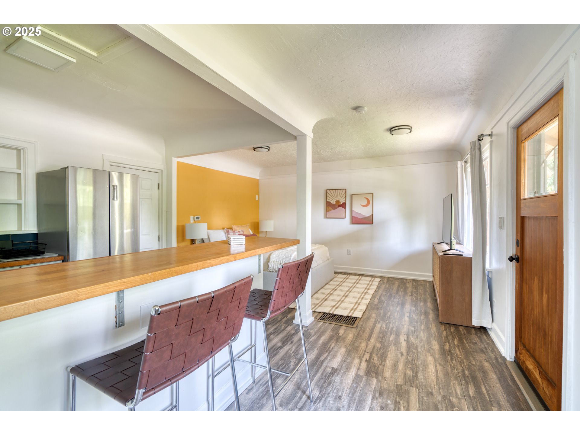 9647 Southwest Capitol Highway Portland, OR 97219 - Photo 33 of 33 a living room with stainless steel appliances furniture and a kitchen view