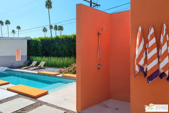 a outdoor space with pool and furniture
