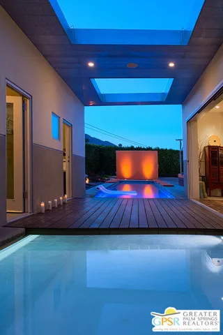 a view of swimming pool with a patio