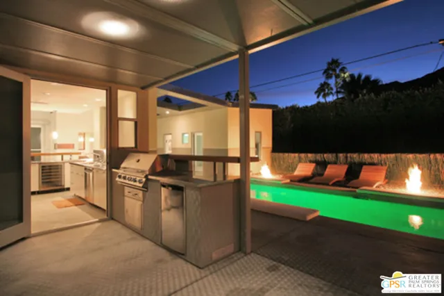 a view of a backyard with a patio