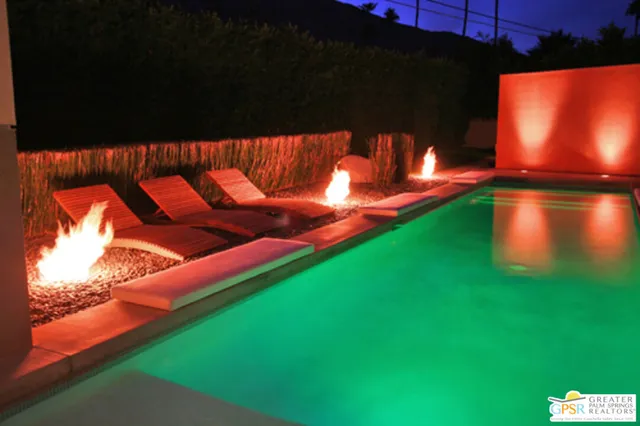 a view of a porch with floor to ceiling window and floor