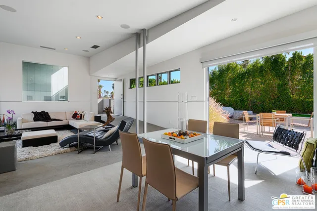 a view of an outdoor sitting area with furniture