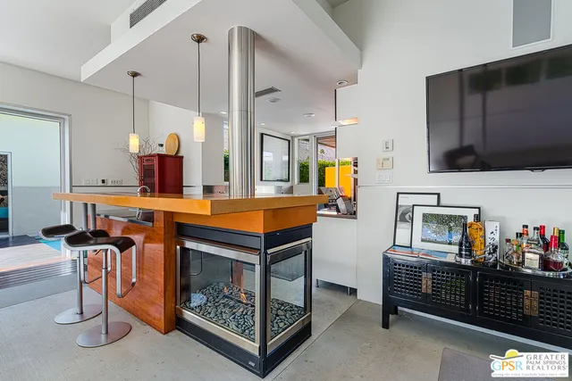 a kitchen with a stove and a microwave
