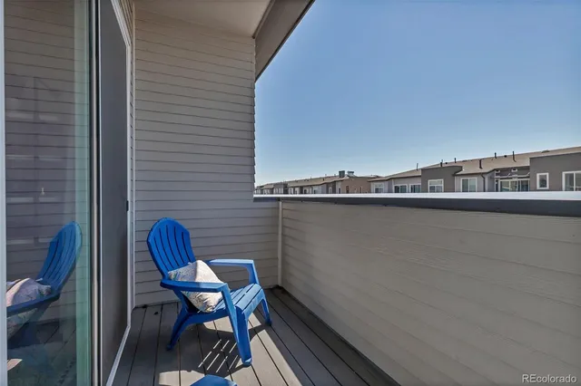 a view of a chairs and table on the terrace
