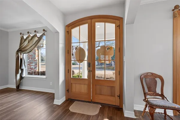 a view of living room with furniture and windows