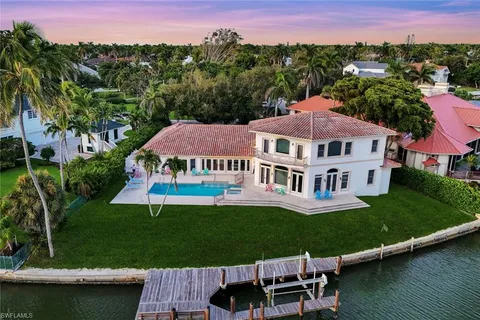 a view of a house with swimming pool