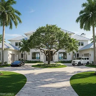 a front view of multiple houses with yard