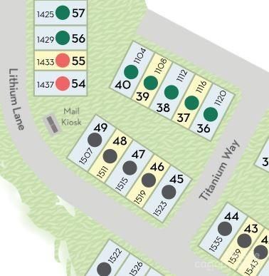 a view of a bedroom with a bed and a couch