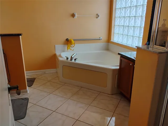 a bathroom with a bathtub