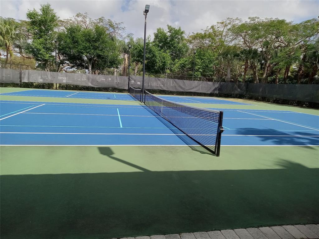 Undisclosed Address Royal Palm Beach, FL 33414 - Photo 32 of 32 a view of a tennis court