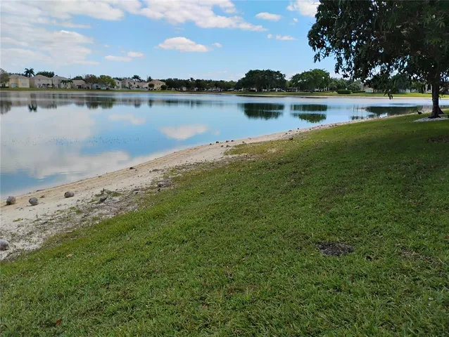 a view of a lake with houses