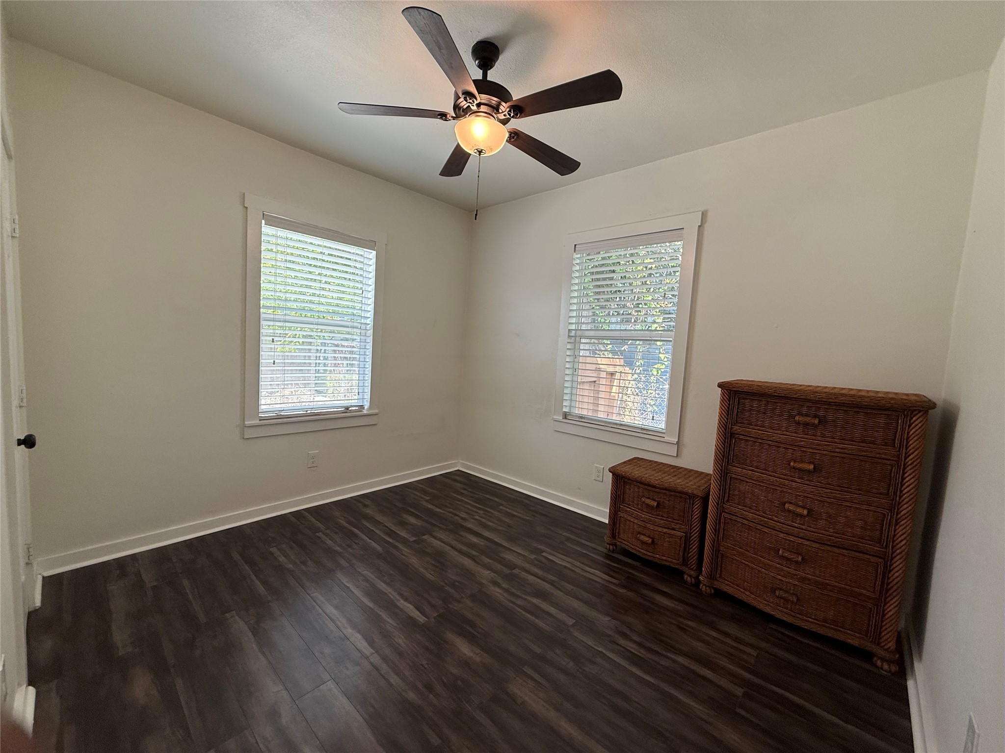 1 Canal Court Houston, TX 77011 - Photo 9 of 18 wooden floor in an empty room with a window