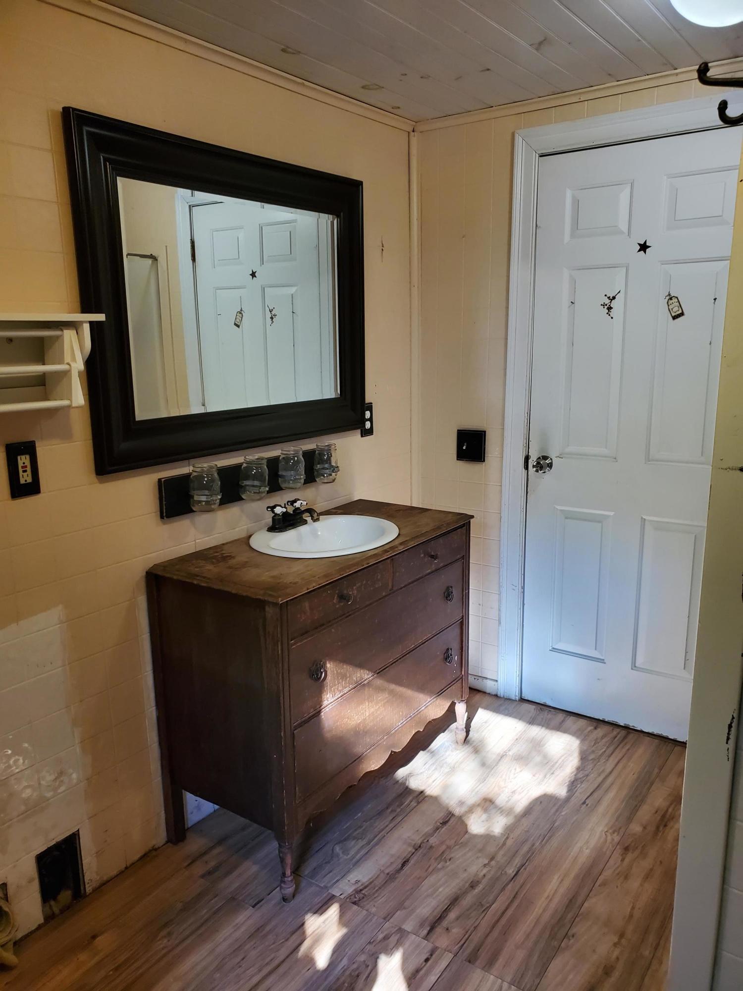 27 Millhouse Road Canaan, ME 04924 - Photo 11 of 47 11 W_D hookup in first floor full bath
