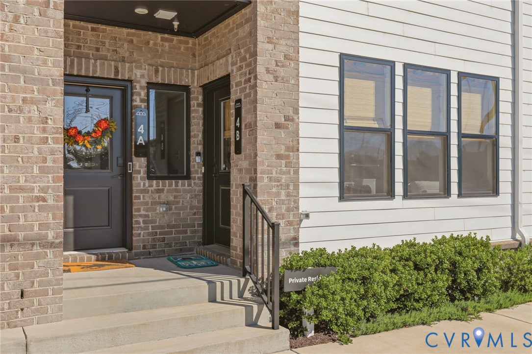 1900 Roseneath Road, Unit 4B Richmond, VA 23230 - Photo 2 of 44 a view of entrance front of house and car parked