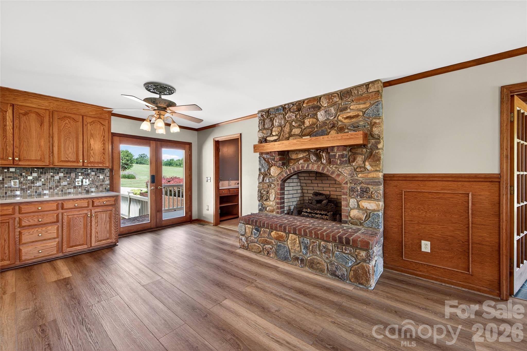 40659 Ridenhour Road Richfield, NC 28137 - Photo 13 of 25 a view of an empty room with a fireplace and window