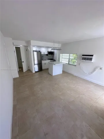 a room with furniture and window