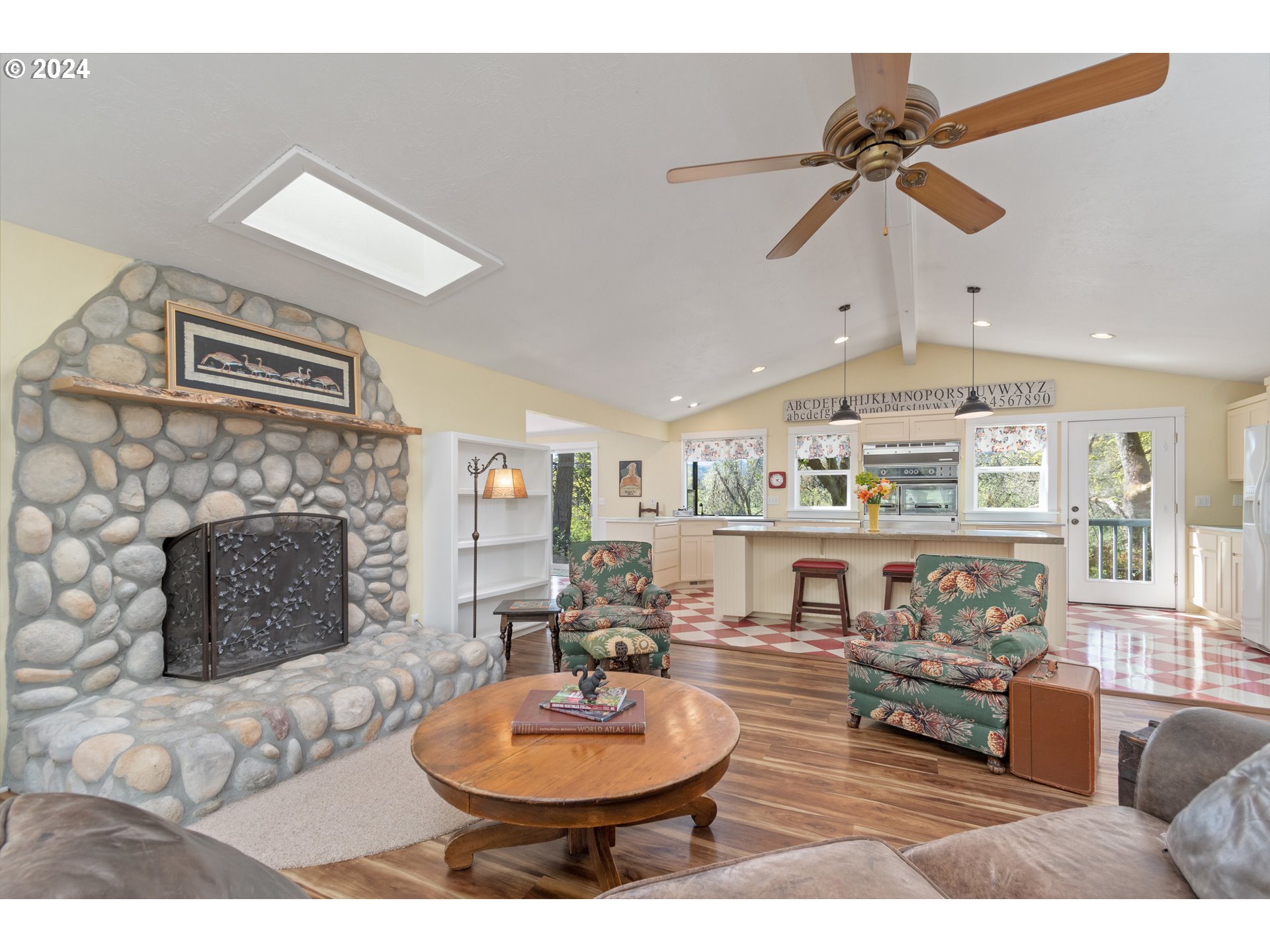 90482 Sunderman Road Springfield, OR 97478 - Photo 13 of 40 a living room with furniture and a fireplace
