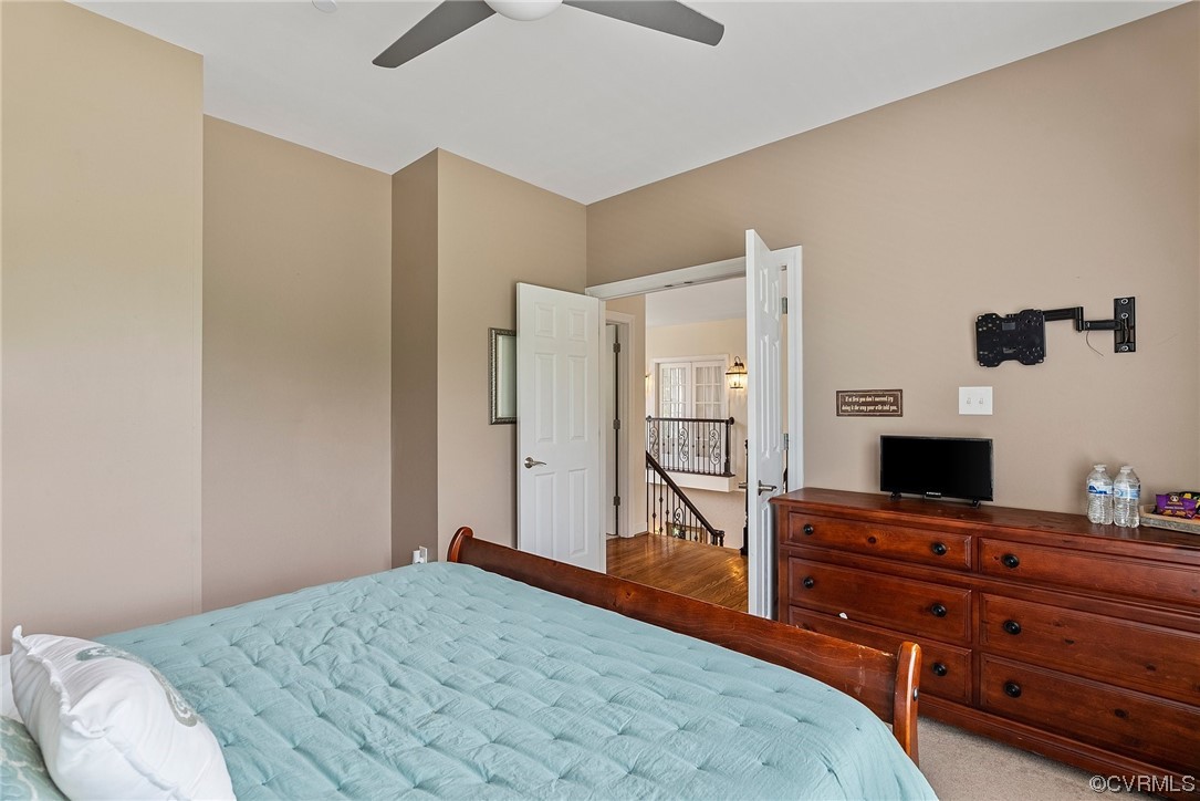 20065 Beaver Dam Road Beaverdam, VA 23015 - Photo 27 of 41 a bedroom with a bed and a flat tv screen on a dresser