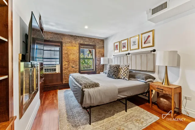 a kitchen with stainless steel appliances granite countertop a stove and a sink