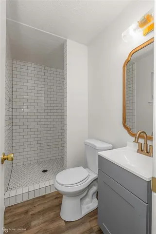 a bathroom with a toilet and a sink