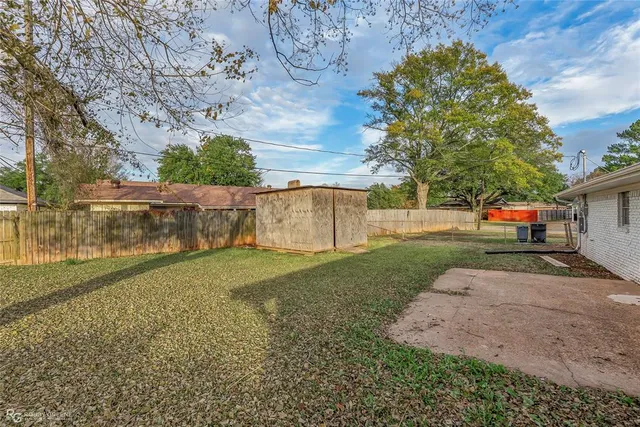 a view of backyard with outdoor space