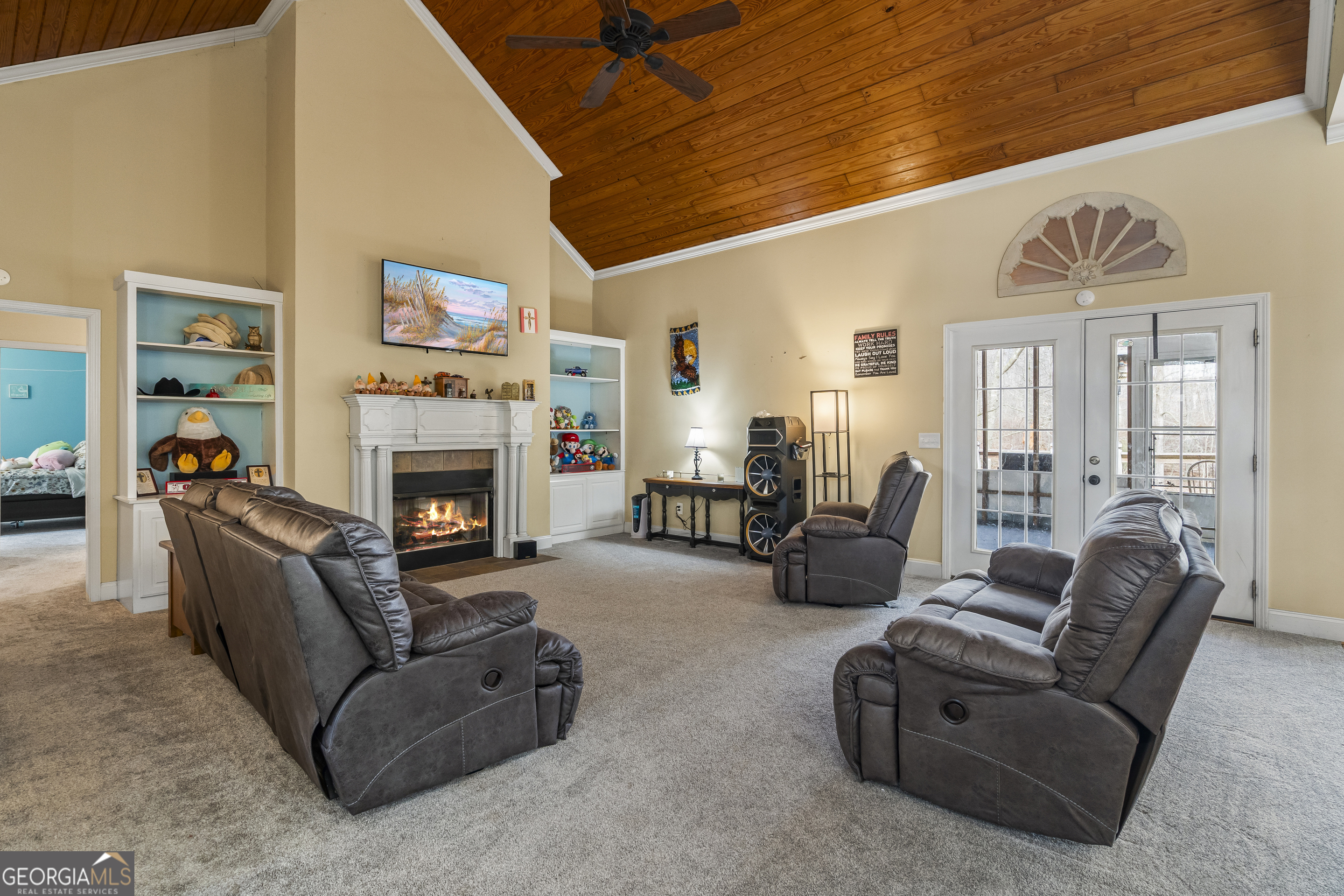 568 Hunt Road Carnesville, GA 30521 - Photo 13 of 106 a living room with furniture and a fireplace
