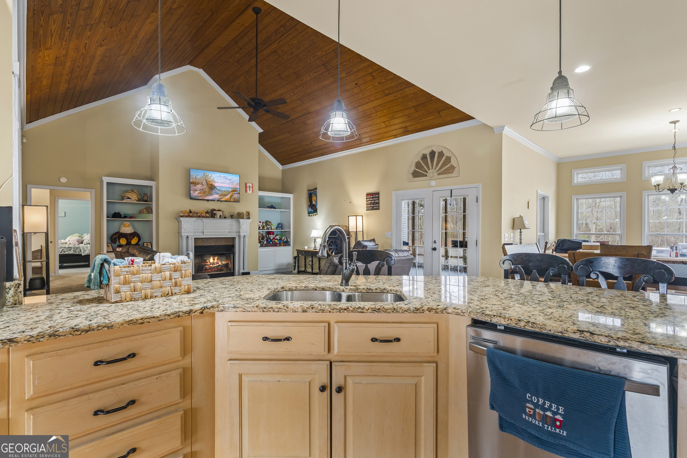 568 Hunt Road Carnesville, GA 30521 - Photo 24 of 106 a bathroom with a granite countertop sink a mirror and shower