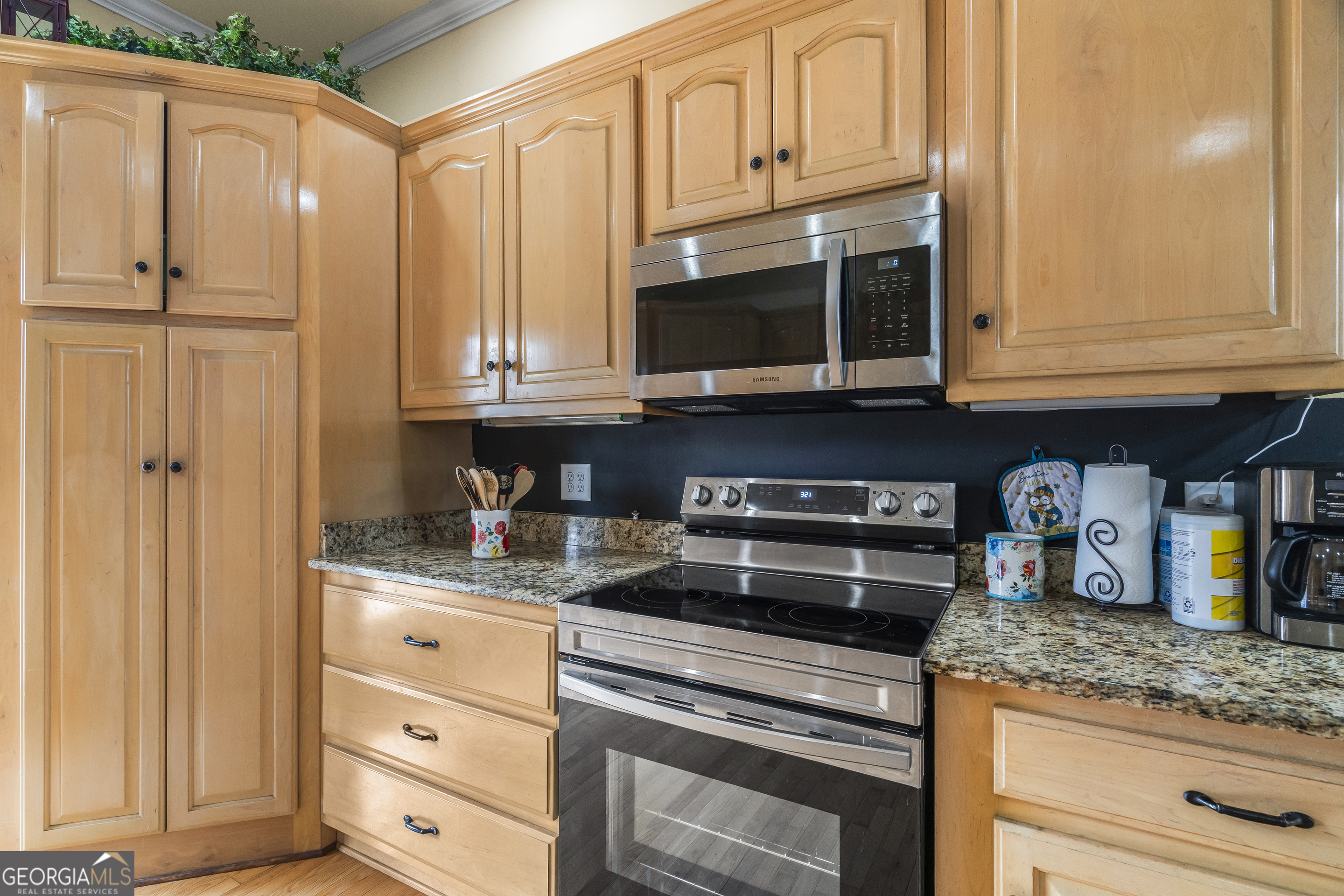 568 Hunt Road Carnesville, GA 30521 - Photo 25 of 106 a kitchen with granite countertop cabinets and steel stainless steel appliances