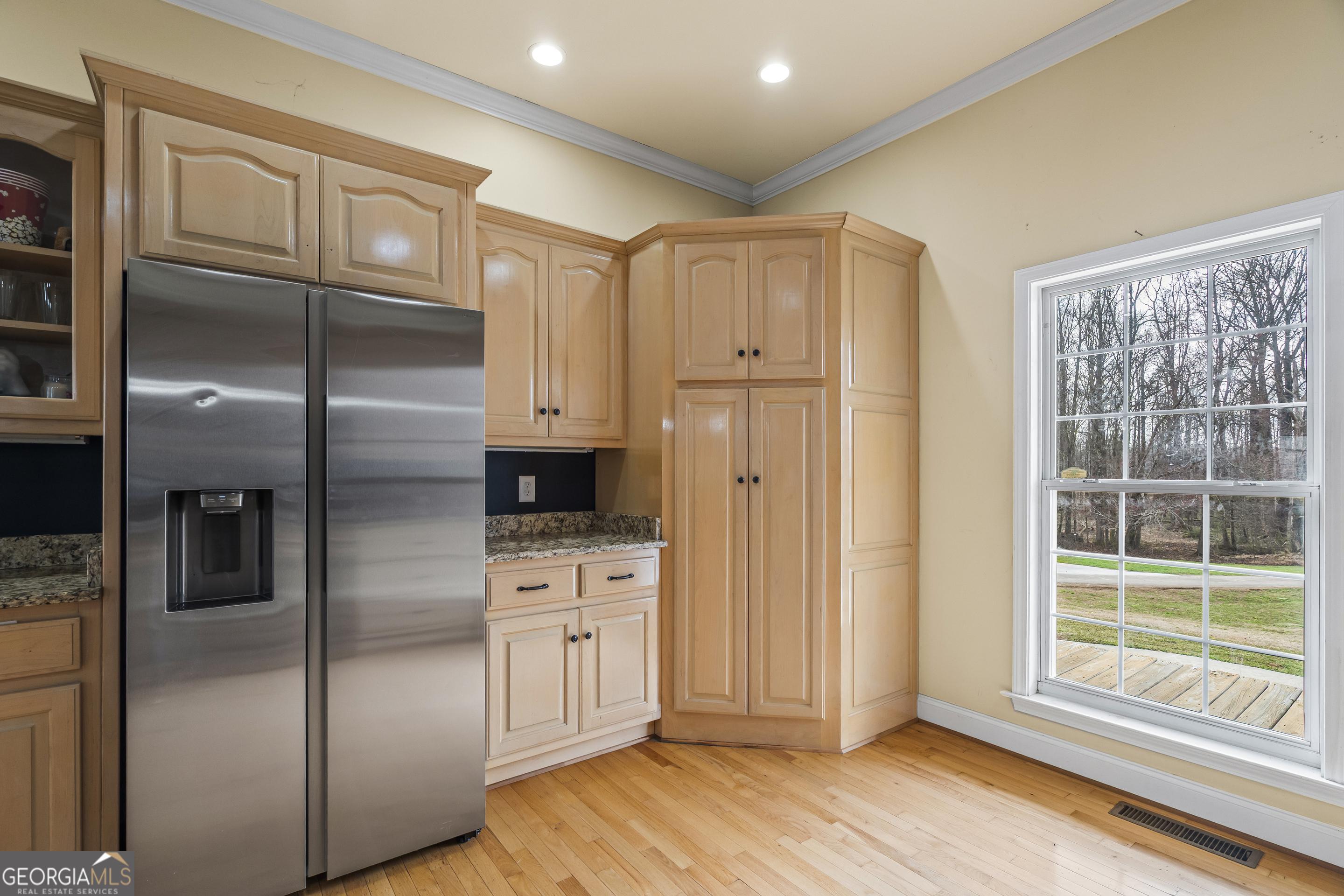 568 Hunt Road Carnesville, GA 30521 - Photo 26 of 106 a kitchen with stainless steel appliances granite countertop a refrigerator and a sink