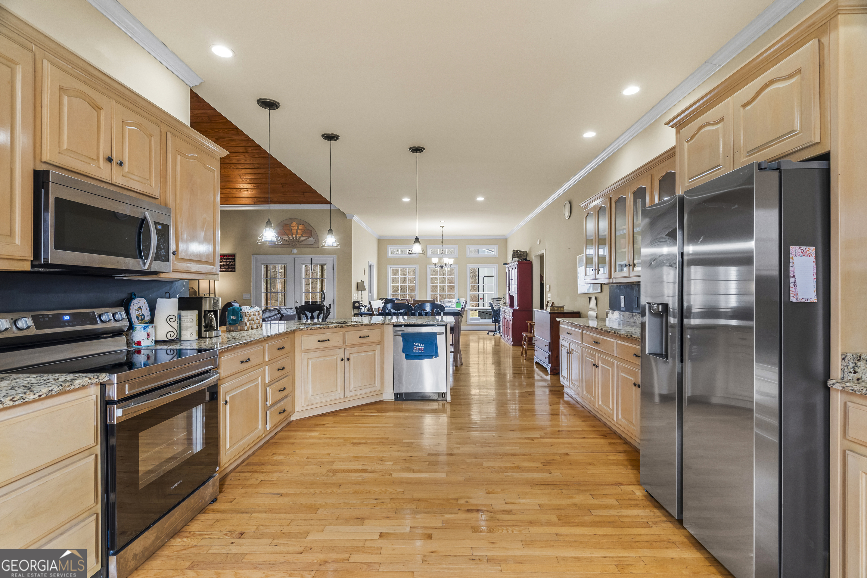 568 Hunt Road Carnesville, GA 30521 - Photo 27 of 106 a large white kitchen with stainless steel appliances